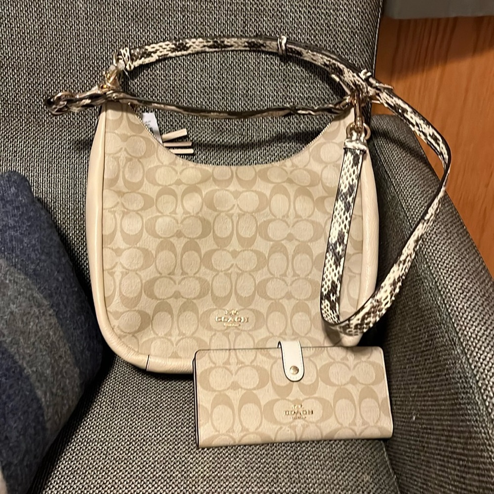 New with tags Coach bag and wallet. Comes with two straps. Vinyl exterior.